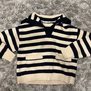 Stripped cream and black knit boating sweater, size M.